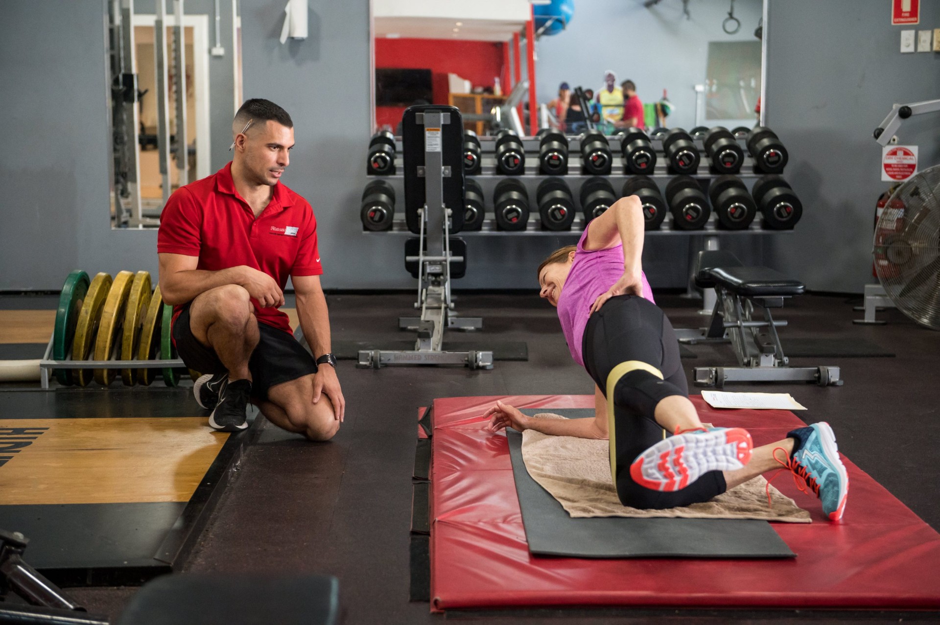 Exercise Physiologist supervising patient